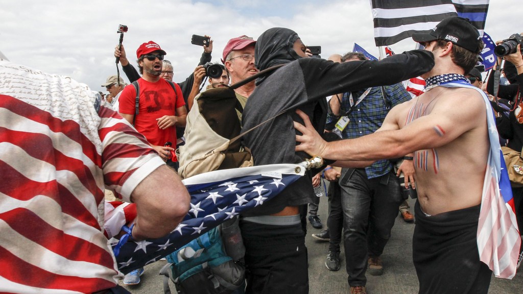 170326094918-01-trump-rally-violence-0325-restricted
