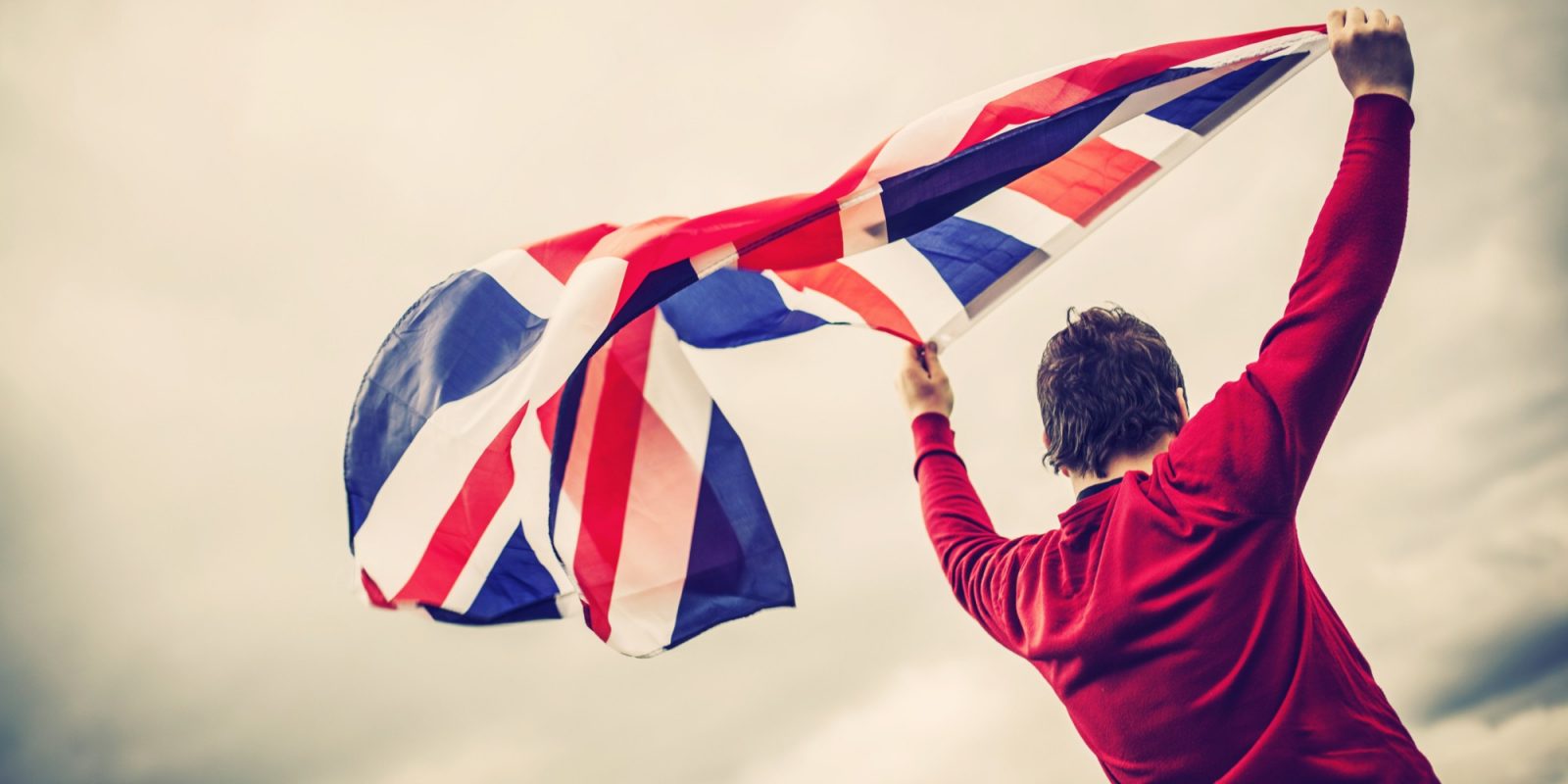 Man waving Union jack flag
