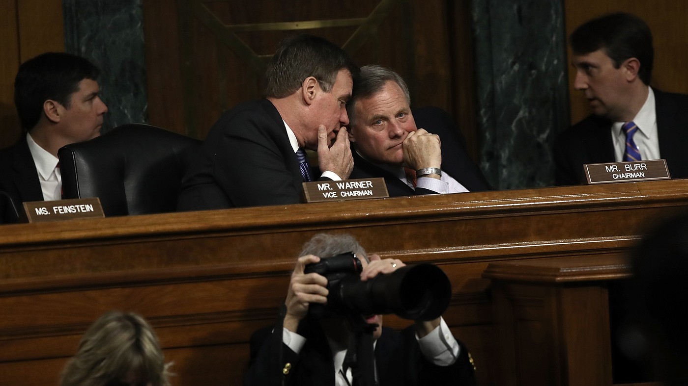 Senate Select Intelligence Committee Chairman Sen. Richard Burr, right, confers with ranking member Sen. Mark Warner, left, during a hearing of the Senate Select Intelligence Committee Thursday in Washington, D.C.